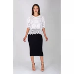 Blusa perforada cuello halter, bajo fantasía.